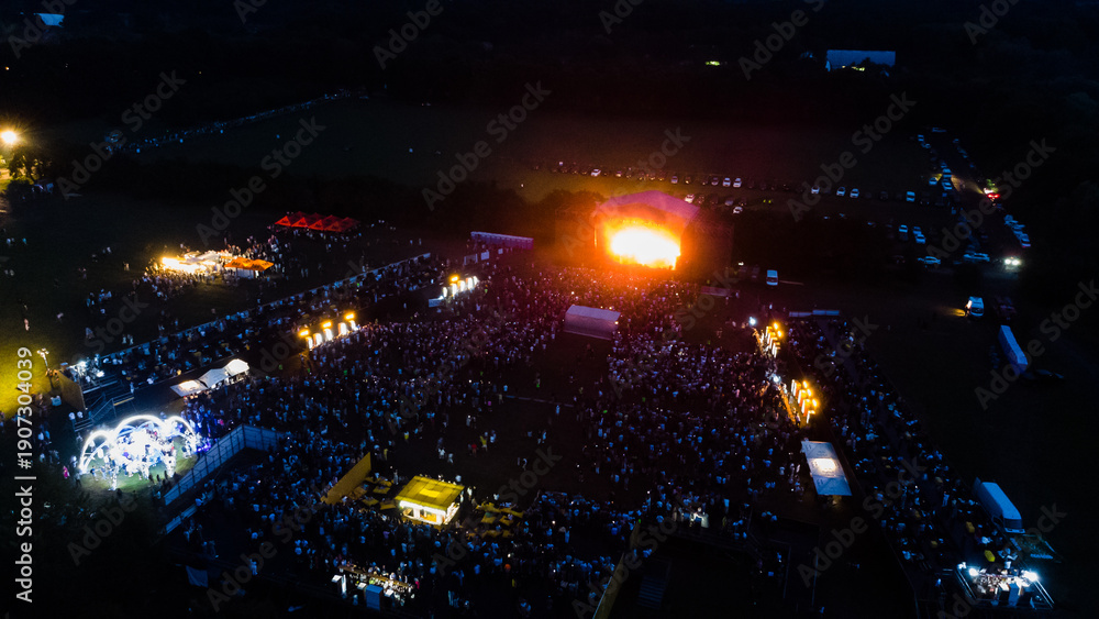 Obraz premium concert light show, Stage lights, Festival field.