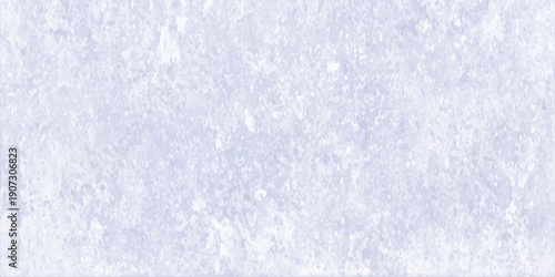 A closeup of an abstract blue grunge paper texture featuring a cold winter pattern of frost and ice crystals on a textured marble surface for a seasonal Christmas wallpaper