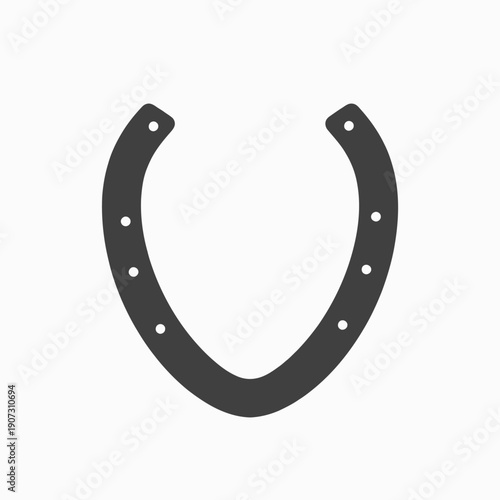 Close-Up of a Metal Horseshoe on White Background with Evenly Spaced Nail Holes Symbolizing Luck and Protection in Equine and Rustic Traditions