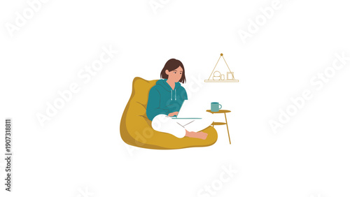 Woman Sitting on Beanbag Chair with Laptop and Coffee