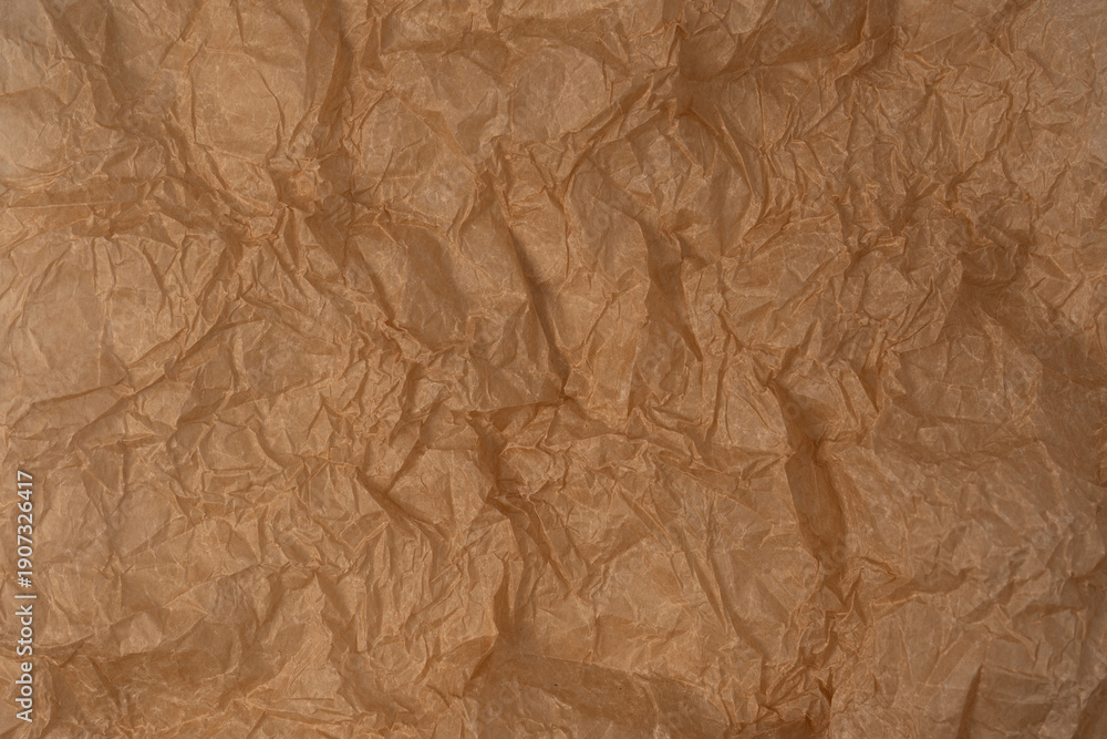 Fototapeta premium Crumpled paper as background. Top view.
