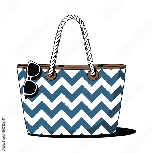 A stylish blue and white chevron tote bag with sunglasses on a clean white background