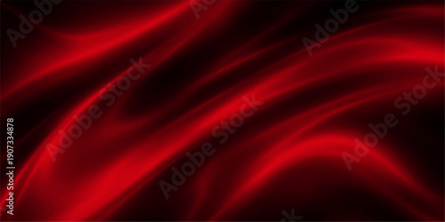 Smooth flowing red silk and satin fabric creates a soft wave texture with light motion curves for a luxury textile backdrop design and wallpaper decoration
