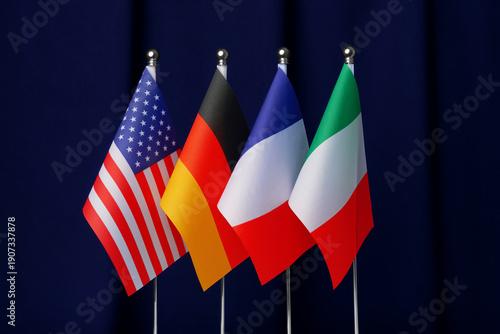 USA and leading European countries flags during diplomatic negotiations