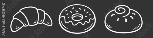 Hand-drawn white line art icons of a croissant, donut, and pastry bun on a black background. Minimalist bakery doodles for cafe menus and designs.