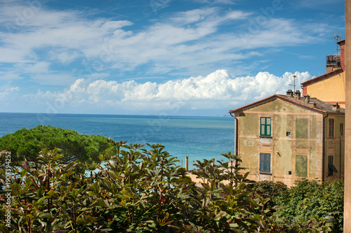house with green shutters on the Mediterranean coast