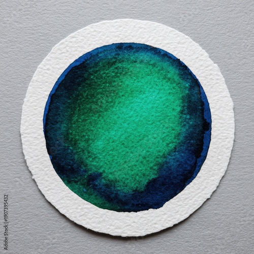 Round watercolor painting on textured paper, shades of blue and green