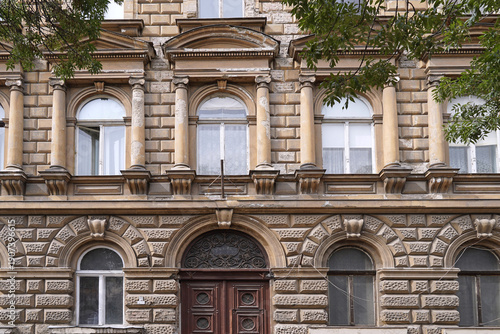 Wallpaper Mural Facade of ornate old apartment building with crumbling masonry Torontodigital.ca