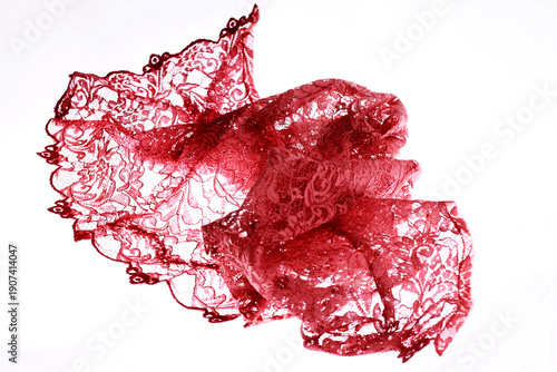 Bilde på lerret Red brocade fabric texture isolated on white background.