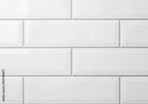 Fresh white grout filling the joints between rectangular ceramic subway tiles in a clean modern kitchen or bathroom wall surface area, background, ceramic, renovation