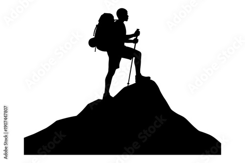Silhouette of hiker standing proudly atop a mountain peak achieving success