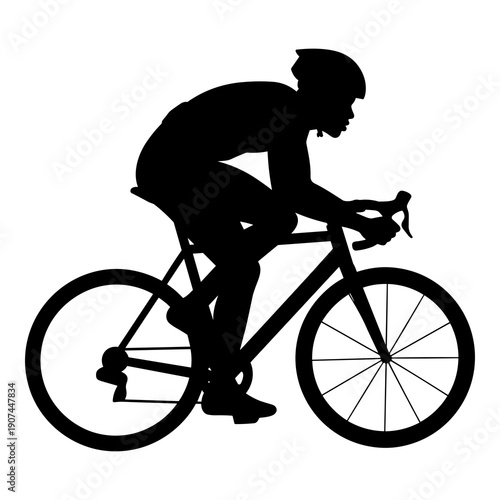 Silhouette of a dedicated cyclist riding a racing bicycle quickly forward