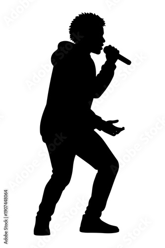Silhouette of a male singer performing live music passionately with a microphone