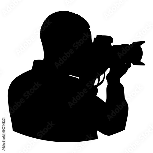 Silhouette of professional photographer capturing images through a camera lens