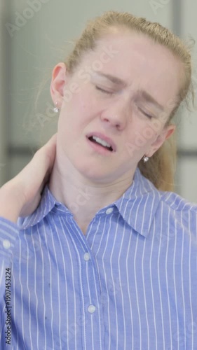 Portrait of Tired Young Woman with Neck Pain, vertical video