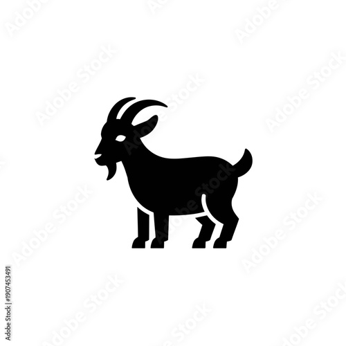 A black silhouette of a goat standing on a white background, depicted in a simple and modern vector graphic style.