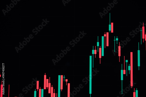 A financial graph shows stocks rising sharply on screen