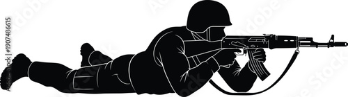 Black Silhouette of a Tactical Soldier in Prone Shooting Position Holding an Assault Rifle Wearing a Combat Helmet Isolated on White for Military Design