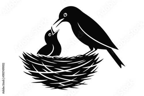 Black and white silhouette of bird feeding chick in nest