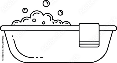 Luxury Bathtub with Bubbles and Towel - Perfect for Relaxation and Spa Treatments