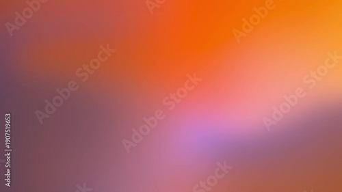 Vibrant abstract background with warm hues reminiscent of a painter's brush strokes and a colorful gradient effect