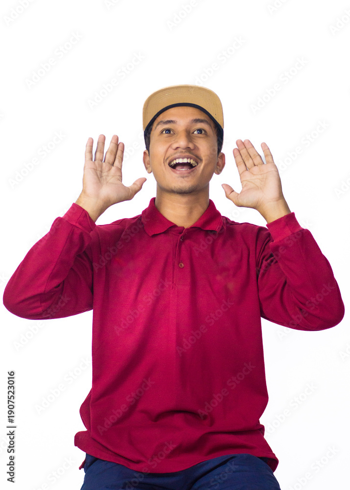 Naklejka premium Excited Young Asian Man Cupping Hands and Shouting an Announcement