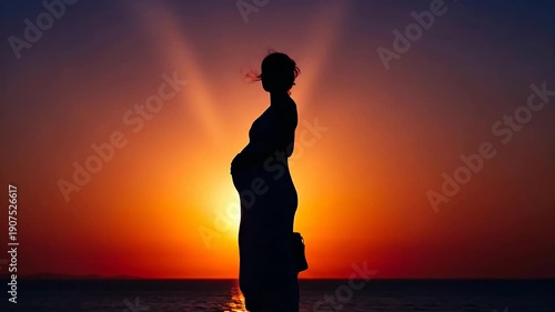 Wallpaper Mural Silhouette of a person standing during a vibrant sunset with colorful sky. Torontodigital.ca