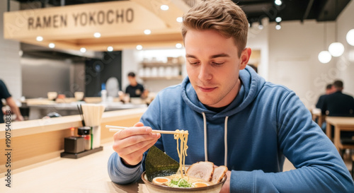 Caucasian people eating ramen at a Japanese ramen shop