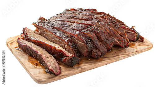 Sliced smoked brisket on a wooden cutting board with rich glaze and juices