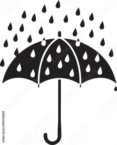 Umbrella with raindrops falling from it on a rainy day