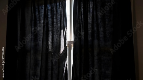 WindowWithDarkCurtains
