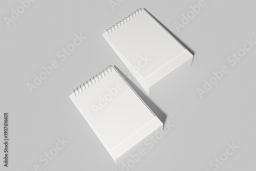 Pair of Spiral Bound Desk Calendars Angled View Mockup