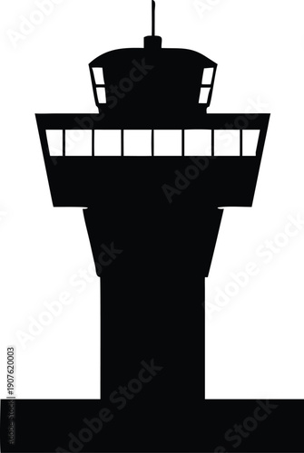 A stark black silhouette of an airport air traffic control tower stands