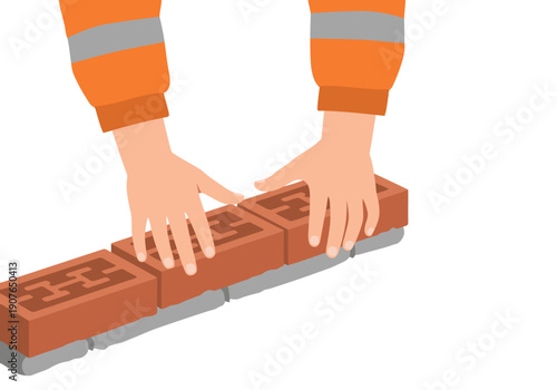 Construction mason carefully places a brick, showcasing precision and skill. Vibrant orange and yellow safety vest highlights the focus on bricklaying. Professional masonry work.