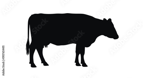 A stark silhouette of a cow against a plain white background
