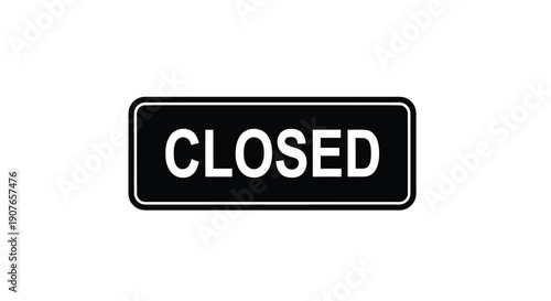 A black sign displaying the word closed in white capital letters