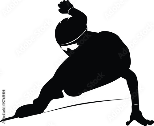 Silhouette speed skater turning on ice track
