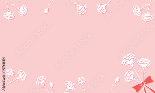 リボンで結ばれたカーネーションの花とカーネーションが飾られたピンクの立体的なフレーム