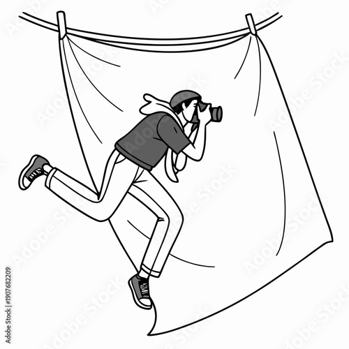 Photographer tangled in studio backdrop fabric, creative process mishap, funny behind-the-scenes moment.