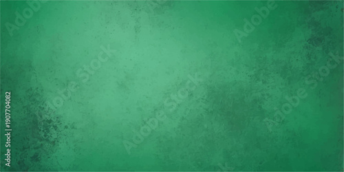 Green grunge textured background with vintage aged look
