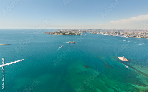 Wallpaper Mural Istanbul, Turkey. Fatih district and Golden Horn with dry bulk carrier in Bosphorus strait, view of Maiden's Tower and Beyoglu. Aerial view at summer midday. Aerial view. Torontodigital.ca