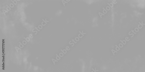 Abstract gray halftone background with subtle dotted texture and smooth tonal variations.