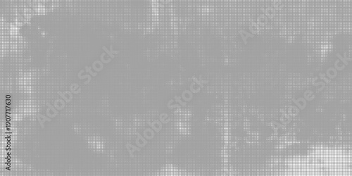Abstract gray halftone background with subtle dotted texture and smooth tonal variations.