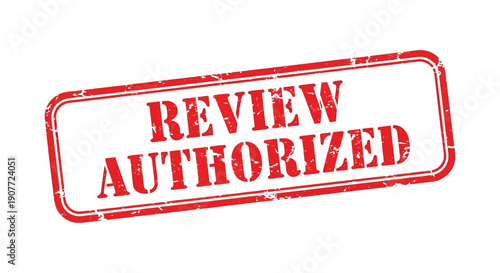 A distressed red rubber stamp displays the words review authorized in bold capitalized lettering signifying approval high quality professional detailed modern