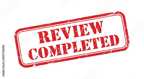 A distressed rectangular red stamp displays the words review completed in bold uppercase lettering indicating a finished assessment high quality professional