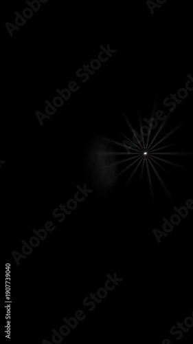 Wallpaper Mural White light radiates outward forming a starburst pattern against a black background Torontodigital.ca