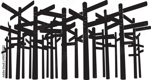 Black wooden fence posts in a chaotic arrangement pattern