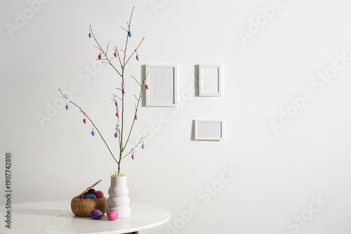 Vase with tree branches and...