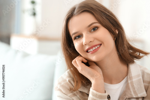 Smiling young woman with de...