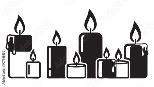 Assortedcandleswithflamesinvarioussizesandshapes